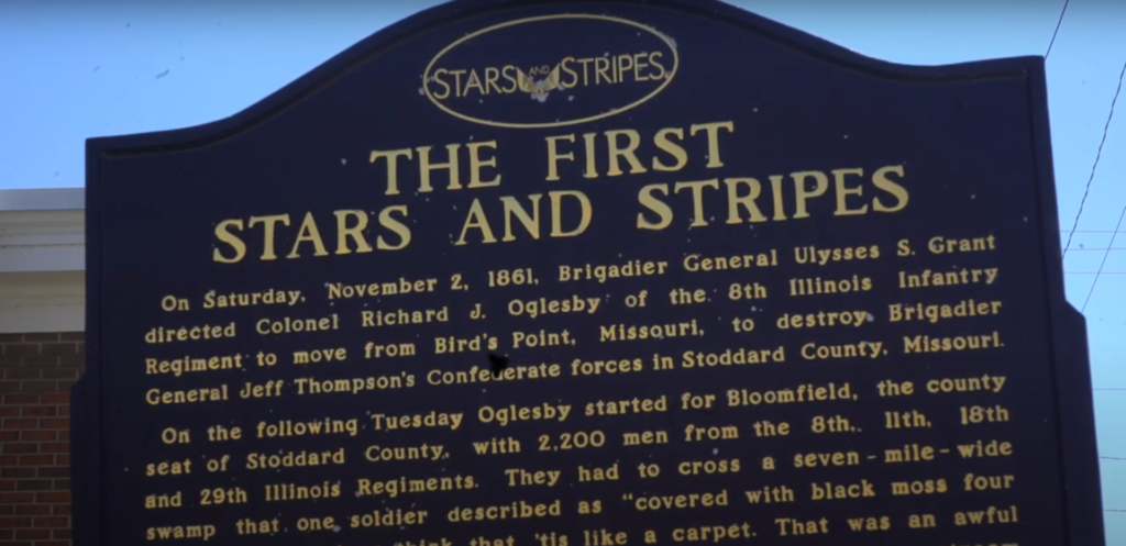 The First Stars and Stripes sign with text
