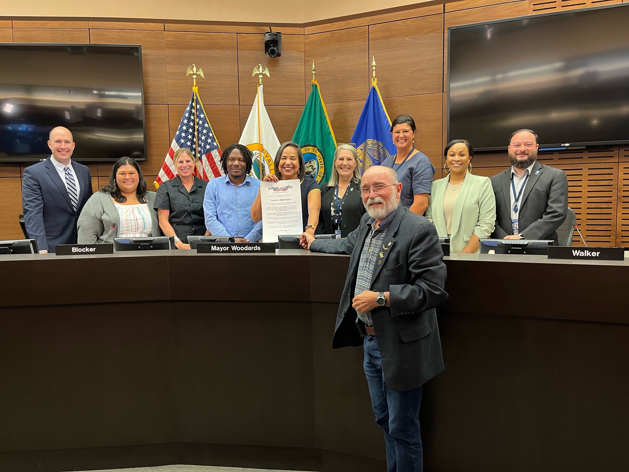On Tuesday, August 23, 2022, Jim Martin presented the Stars and Stripes City Proclamation to Tacoma, Washington which was accepted by Mayor Woodards and the City Council of Tacoma