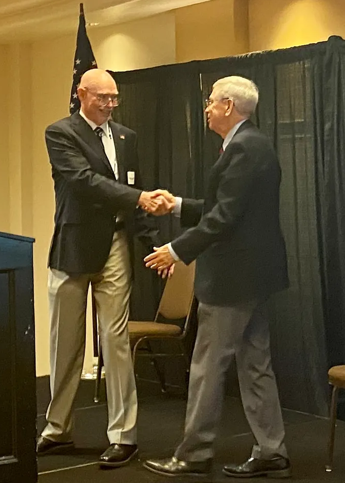 two men shaking hands
