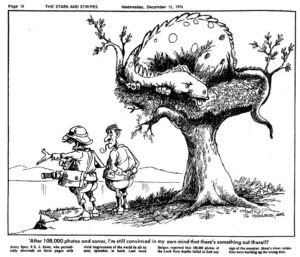 cartoon of two men looking at a lake with the monster curled up in the top of a tree