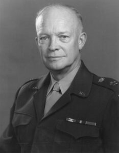 Black and white military portrait of General Dwight D. Eisenhower in his World War II uniform. Eisenhower was the Supreme Allied Commander who authorized the 1942 revival of the Stars and Stripes newspaper.