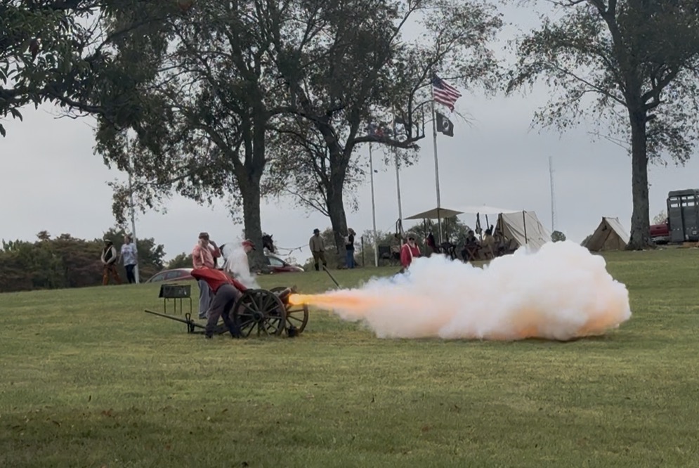 Col. Wickliffe CSA reenactment group firing a historic cannon at Liberty Days