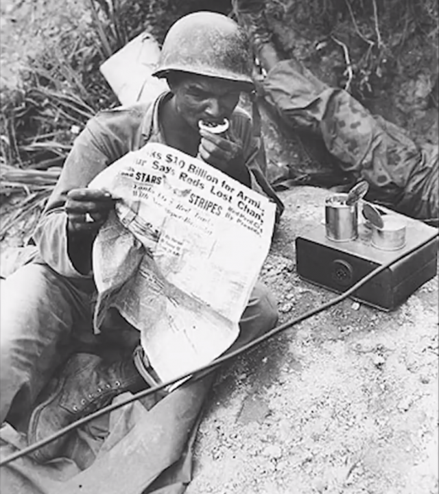 deployed soldier reading stars and stripes