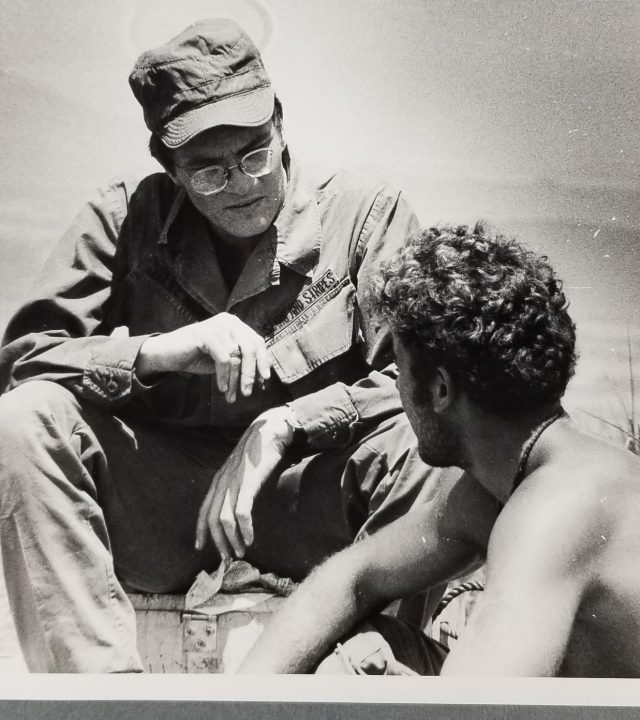 Stars and Stripes reporter speaking with a soldier